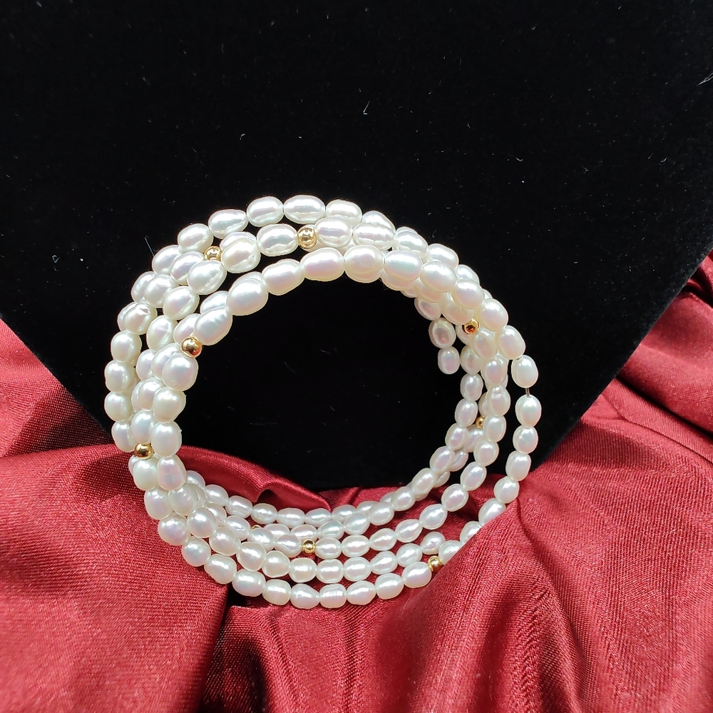 Freshwater Seed Pearls On A Memory Wire With Gold Tone Beads.